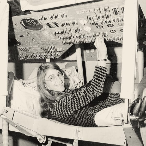 Margaret Hamilton, lead Apollo flight software engineer, inside the Apollo Command Module.